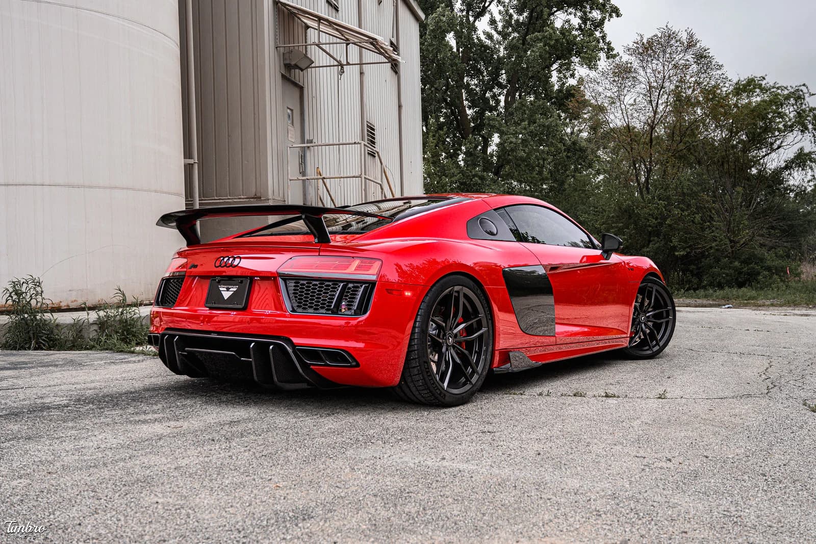 Red Audi R8 with a Vorsteiner rear wing and carbon-fiber aero kit